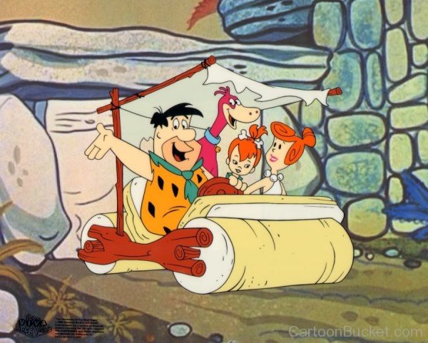 Fred With Wilma,Pebbles And Dino In His Vehicle